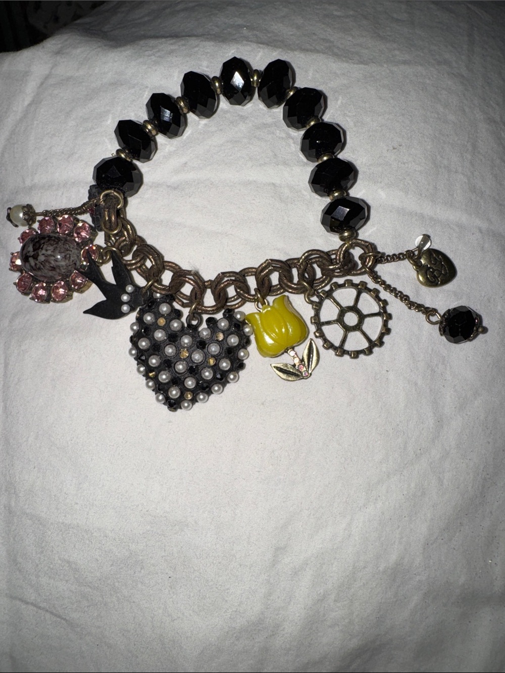 This piece is a RARE vintage Betsey Johnson Y2K COMPLETE Charm Bracelet.